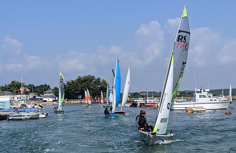 Juniors racing down the river soon after their start at Keyhaven Week photo copyright Mark Jardine taken at Keyhaven Yacht Club and featuring the RS Feva class
