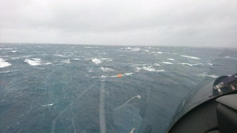 The liferaft is raked by five metre seas after the sailors yacht sank 20nm east of Cape Brett yesterday in winds gusting to 60kts. - photo © Auckland Rescue Helicopter Trust