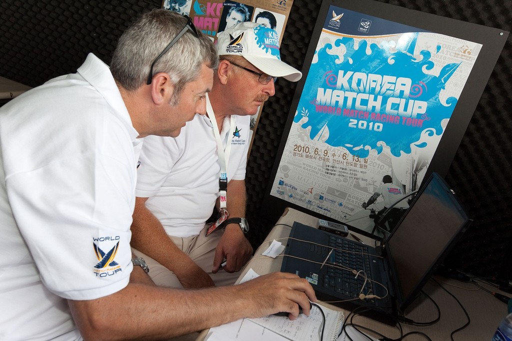 Commentator Martin Tasker (R) discusses the finer points with a cameraman during Korea Match Cup 2010. World Match Racing Tour. Gyeonggi, Korea. 10 June 2010. Photo: Gareth Cooke/Subzero Images photo copyright Subzero Images taken at  and featuring the  class