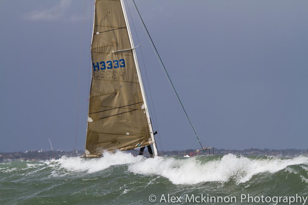 Three Ring Circus setting sail behind one of the many breakers. - 2015Port Phillip Women's Championship Series ©  Alex McKinnon Photography http://www.alexmckinnonphotography.com