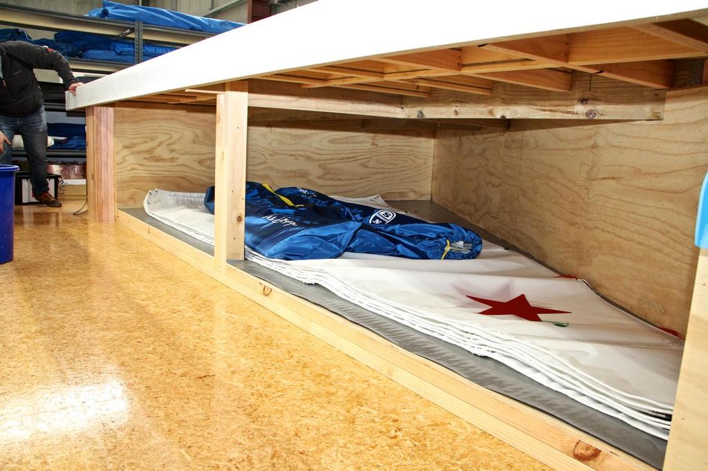 Starling sails stored underneath the loft floor/table - North Sails NZ Loft - July 20, 2016 photo copyright Richard Gladwell www.photosport.co.nz taken at  and featuring the  class