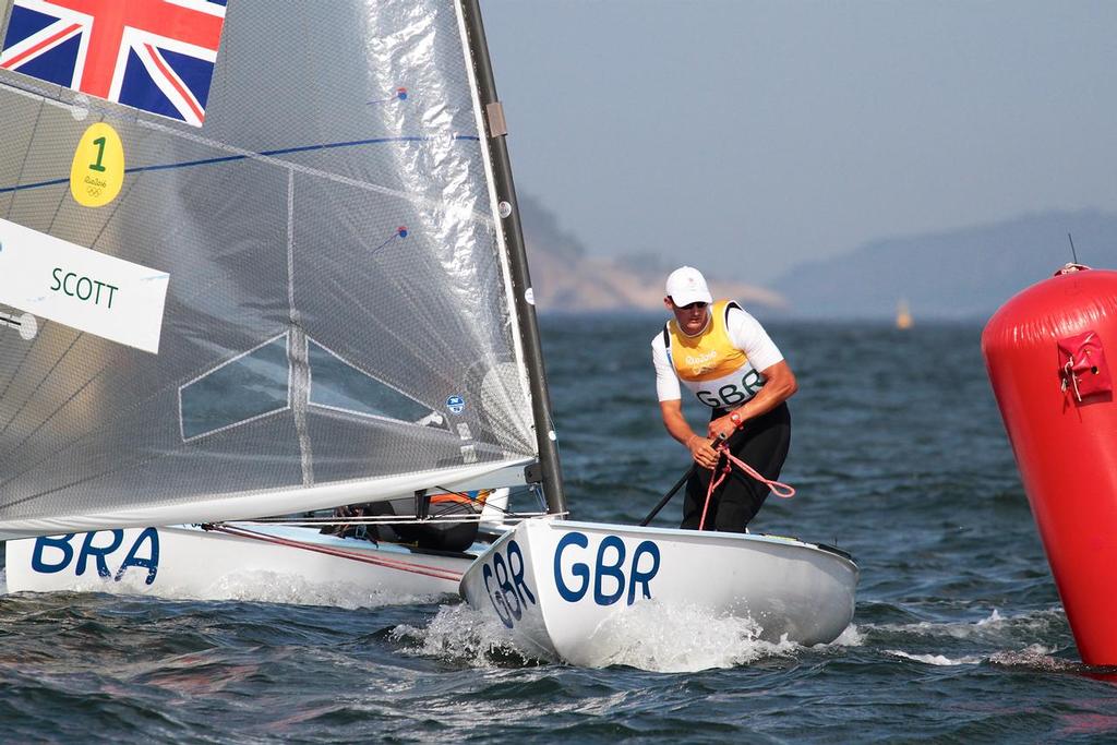 Finn Gold Medalist -  Giles Scott(GBR) rounds the leeward mark in the Finn class medal race - photo © Richard Gladwell www.photosport.co.nz