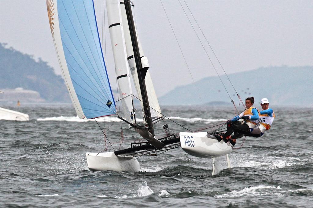 Santiago Lange and Cecilla Saroli about to round the leeward mark in the Nacra 17 Medal race. Summer Olympics photo copyright Richard Gladwell www.photosport.co.nz taken at  and featuring the  class