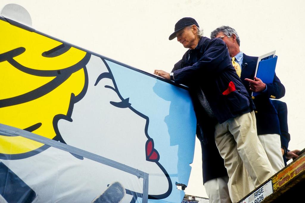 1995 Artist Roy Lichtenstein signs his work of art - the Mermaid on the America's Cup yacht PACT 95, the America's Cup defence team from Bangor, ME.  35mm colour film. © Bob Grieser/Outside Images www.outsideimages.com