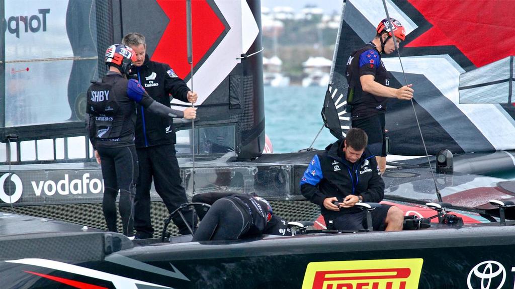 Nervous moments as Peter Burling gets involved in sorting out an issue between races on Day 2 of the Challenger Final when Artemis Racing and Emirates Team New Zealand  were tied on 2-2. photo copyright Richard Gladwell www.photosport.co.nz taken at  and featuring the  class