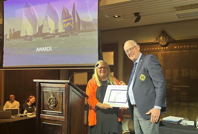 Penny Whiting receiving her Life Membership from RNZYS Commodore Andrew Aitken photo copyright RNZYS  taken at Royal New Zealand Yacht Squadron and featuring the  class