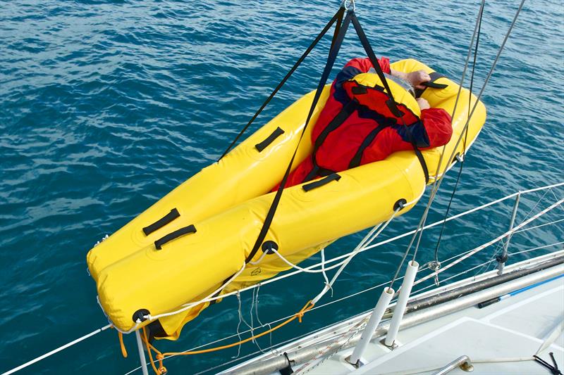 Sea Rescue Sled self inflates into a form that is easy for the sailor to ease into and then be hoisted back on board using a sheet or halyard winch - photo © Lloyd Valentine