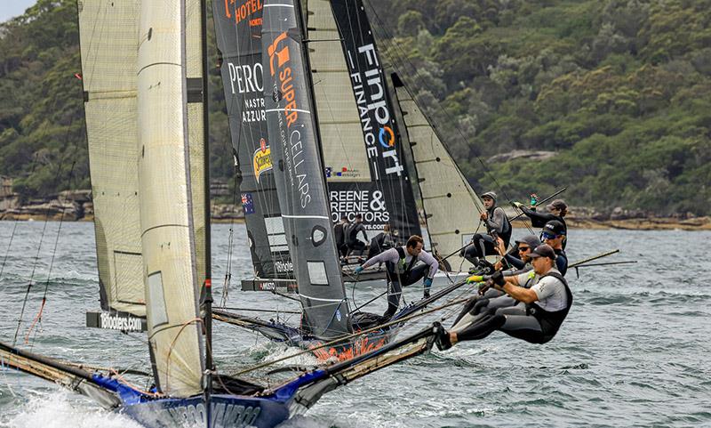 Yandoo approaches the rounding mark with Rag and Famish Hotel hot on their tail photo copyright SailMedia taken at Australian 18 Footers League and featuring the 18ft Skiff class