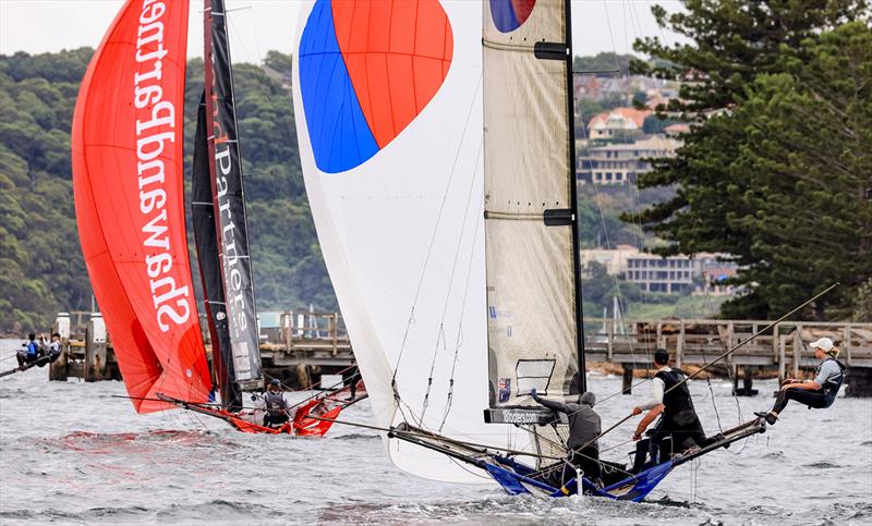 Yandoo chases Shaw and Partners down the spinnaker run during the 18ft Skiff Queen of the Harbour 2024 photo copyright SailMedia taken at Australian 18 Footers League and featuring the 18ft Skiff class