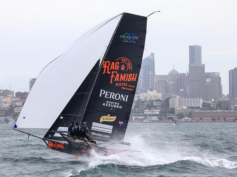 Winning style by the Rag and Famish Hotel crew photo copyright SailMedia taken at Australian 18 Footers League and featuring the 18ft Skiff class