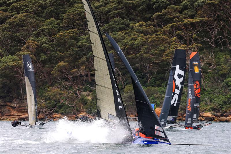 Drama for Fisher and Paykel at the weather mark - 18ft Skiff SIXT Spring Championship Race 3 - photo © SailMedia