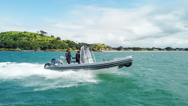 The 23 degree deep vee hull cuts smartly through the chop photo copyright Roger Mills taken at  and featuring the  class