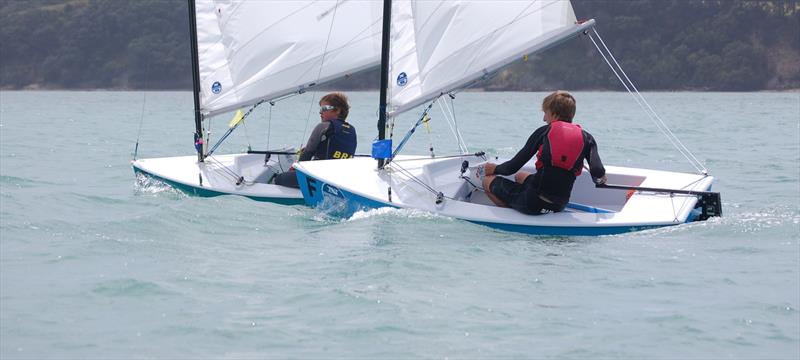 In 2000 the Sail One fibreglass Starlings became a welcome option to parents needing a low-maintenance, competitive boat. George Gautrey (left) and William Linkhorn (right) are battling for control at the 2013 Match Racing Nationals, won by William photo copyright Brian Peet taken at  and featuring the Starling class