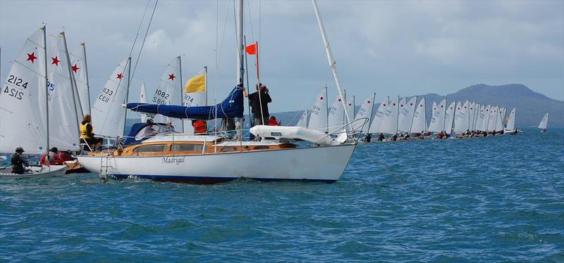 A big Townson starting the flock of little ones. Race Officer Richard Brown's Townson 32 Madrigal as start boat for the 2012 Nationals photo copyright Brian Peet taken at  and featuring the Starling class