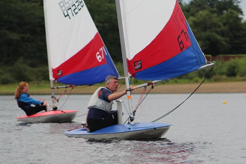 Hollingworth Lake Junior Regatta Week - Millie Hayfield finishes a close 3rd behind Stuart photo copyright Rhiann Bramwell taken at Hollingworth Lake Sailing Club and featuring the Topper class