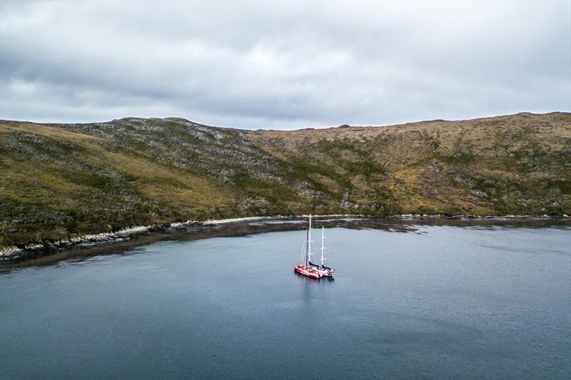 Leg 7 from Auckland to Itajai, day 12 on board MAPFRE, The boat next to the ketch ''Kat'' in a little bay close to Cape Horn to repair the main sail and the mast track, 30 March,  photo copyright Ugo Fonolla / Volvo Ocean Race taken at  and featuring the Volvo One-Design class