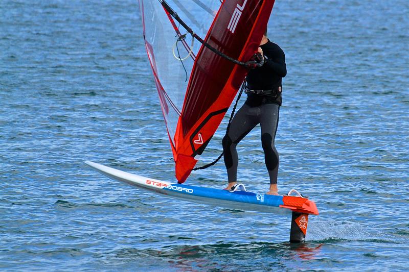 JP Tobin exits a foiling gybe in light airs - Takapuna Beach - October 2018 photo copyright Richard Gladwell taken at Takapuna Boating Club and featuring the Windsurfing class