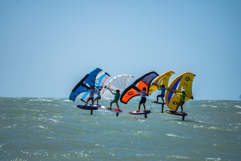 Nia Suardiaz (right) lining up with the women's fleet at start time - Day 2 of WingFoil Racing World Cup Brazil photo copyright IWSA media taken at  and featuring the Wing Foil class