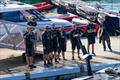 The mainsail is loded by crane - Emirates Team New Zealand -  AC75 - Day 13 - August 28, 2026