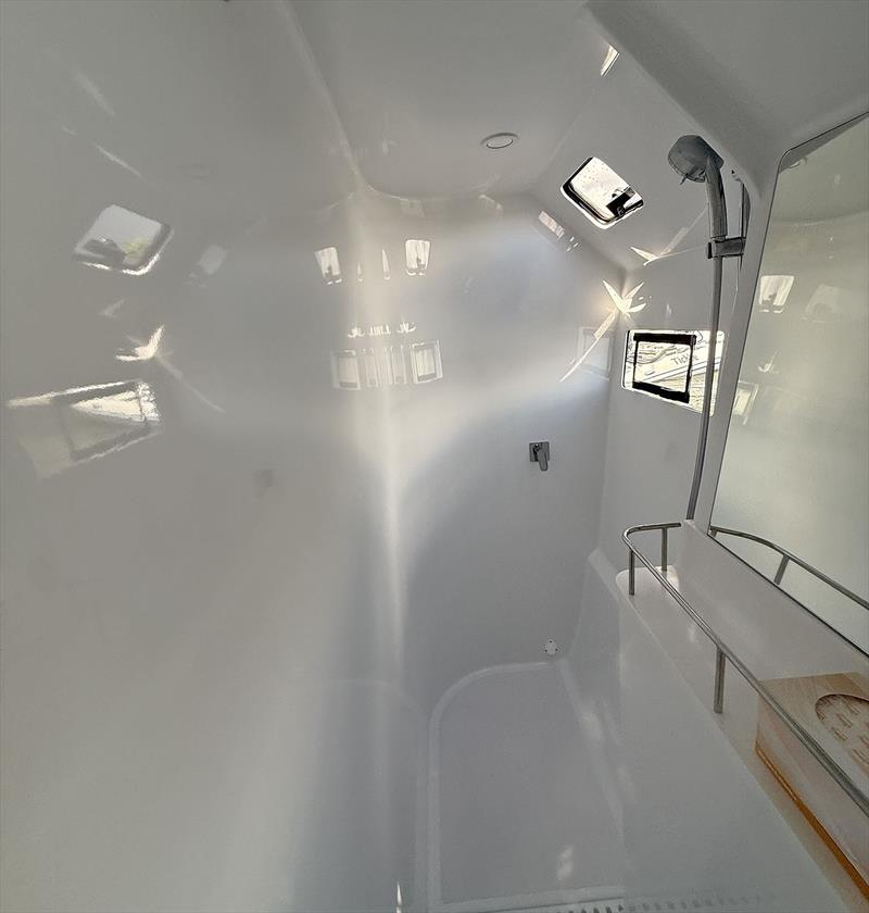 Evening Star - white gloss and low light - cannot hide a thing, so it is good there is nothing to disguise! photo copyright Mahi Boats taken at  and featuring the Catamaran class