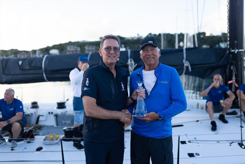 RORC CEO Jeremy Wilton presents skipper Ben Mitchell (right) with the Monohull Line Honours trophy - RORC Caribbean 600 - photo © Arthur Daniel / RORC
