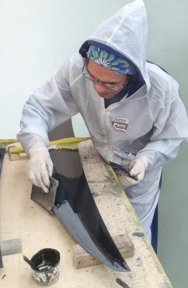 Finishing the leading edge of the F50 rudder elevator - Mackay Boats - September 2025 - photo © Mackay Boats