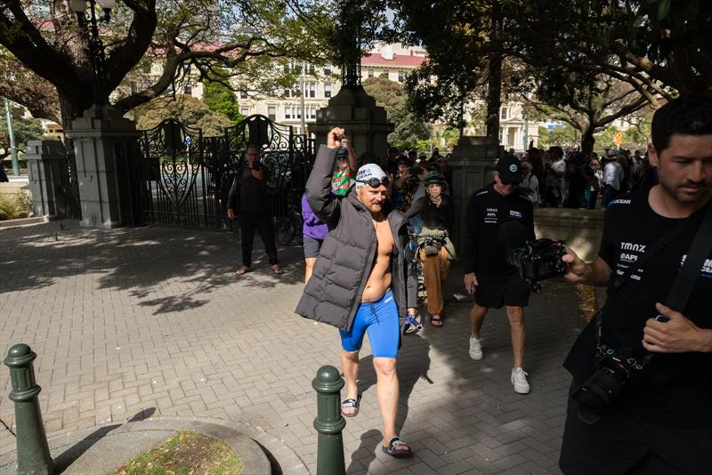 Jono Ridler enters Parliament grounds after completing his 1367km swim - Wellington - April 4, 2026 photo copyright Joshua Mccormack/LiveOcean taken at Royal Port Nicholson Yacht Club and featuring the  class
