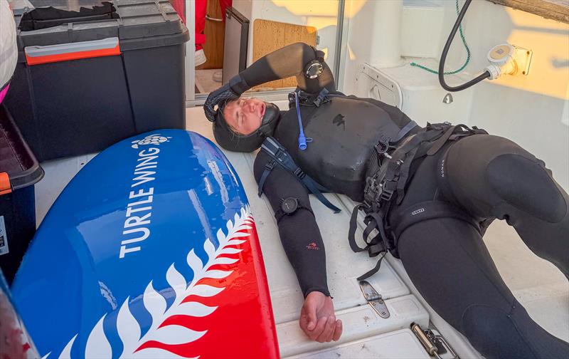 An exhausted Jeremiah McDonald (NZL) after setting two wingfoil distance records off the coast of Nordstranda, Norway - July 19, 2026 - photo © Chantelle Middleton